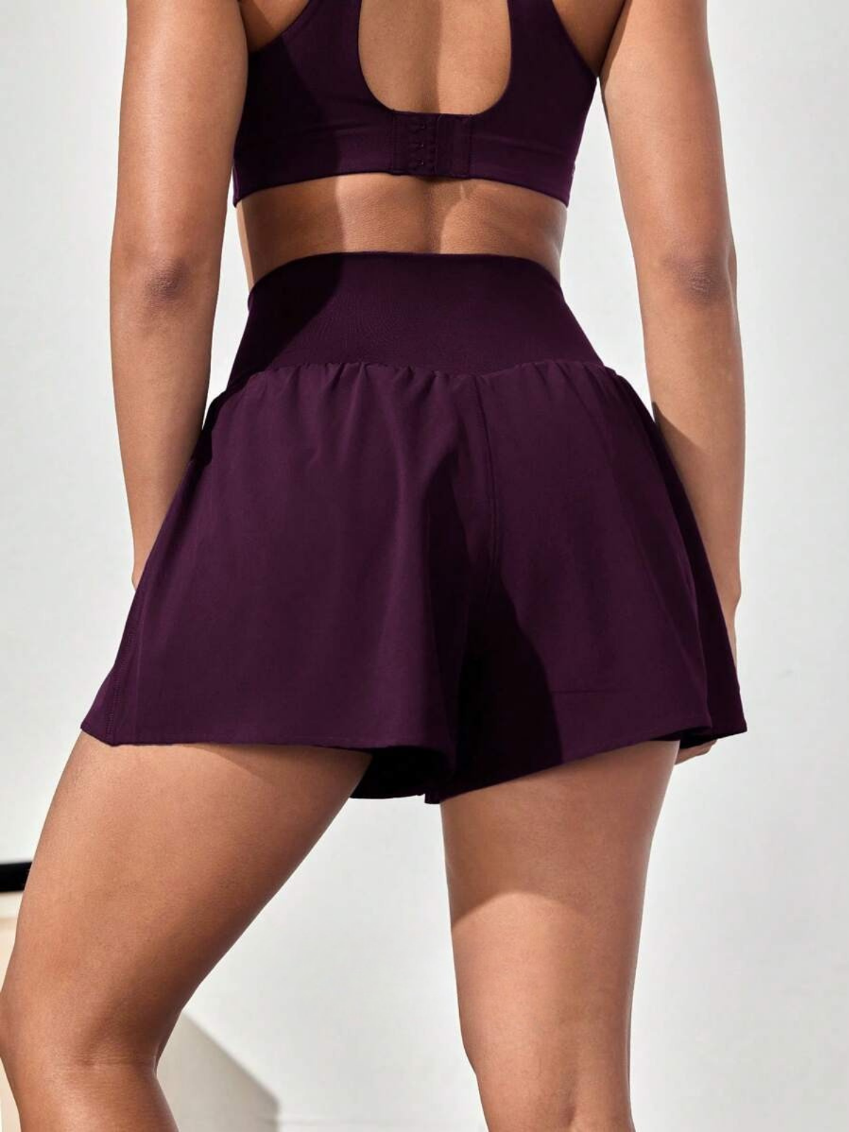 Pantaloncini da corsa antisudore con tasche a vita media e asciugatura rapida