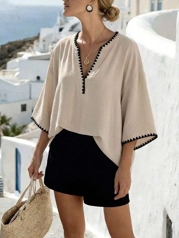 Flowy V-Neck Summer Top with Elegant Black Trim