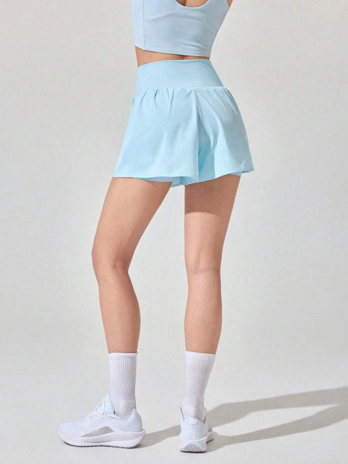 Pantaloncini da corsa antisudore con tasche a vita media e asciugatura rapida