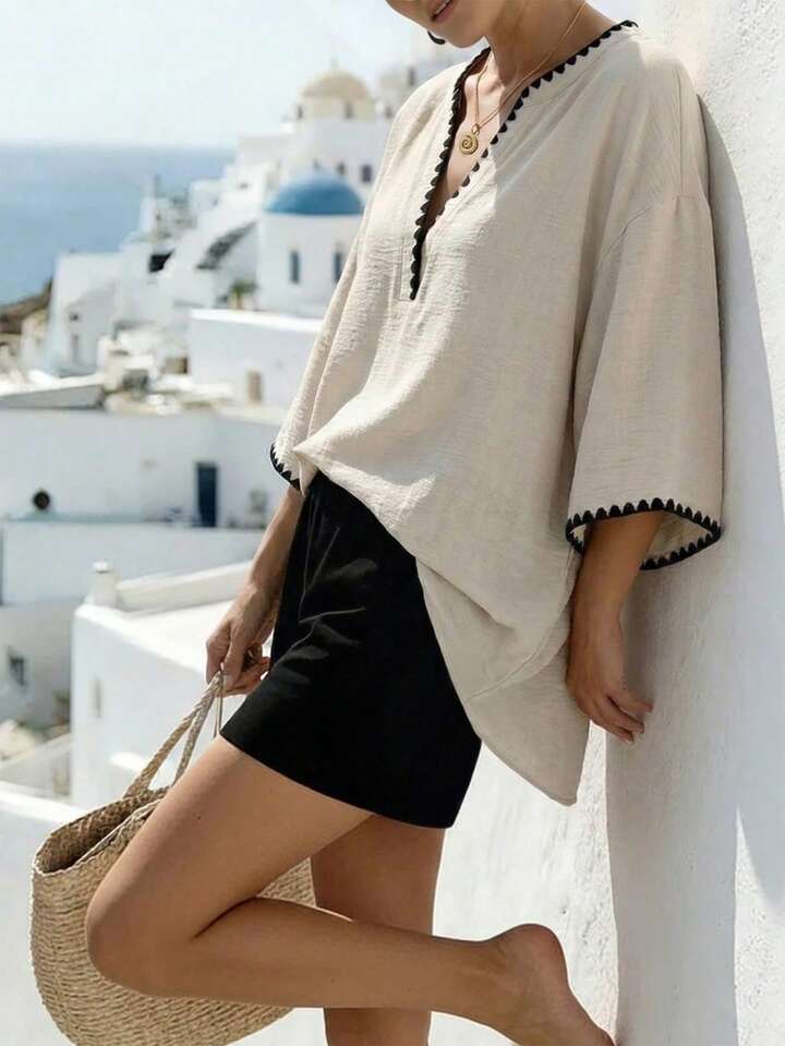 Flowy V-Neck Summer Top with Elegant Black Trim